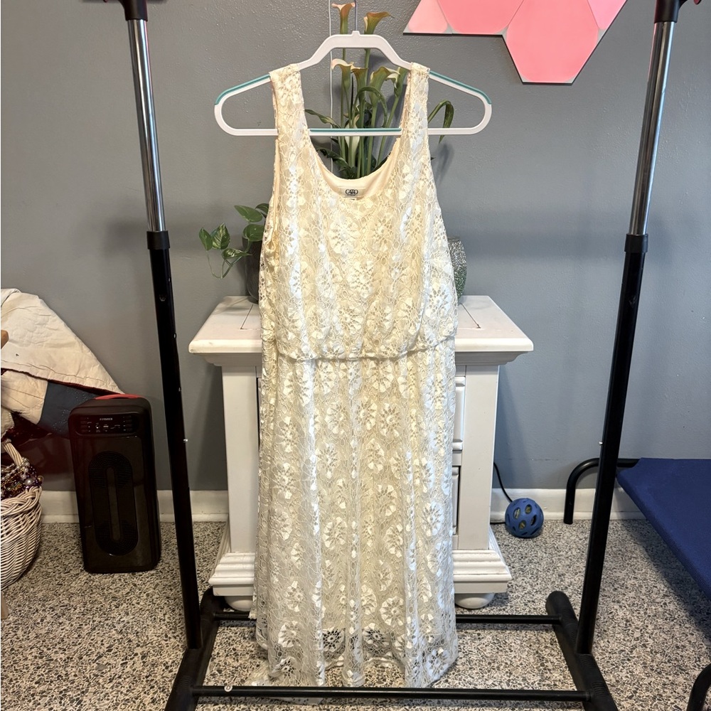 Plus size off white or cream colored white lace dress. Size 18/20